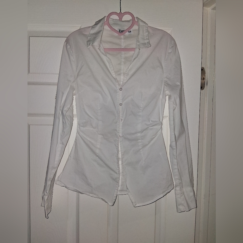 Classic White Button-Down Shirt.